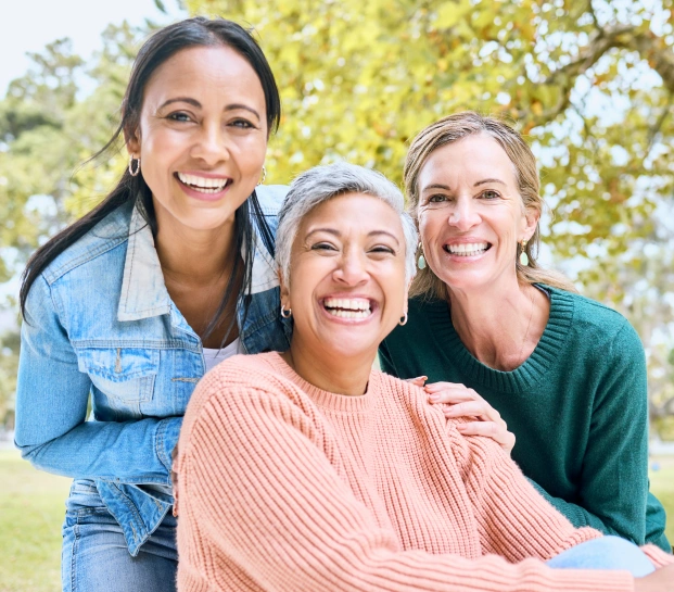 Smiling family representing comprehensive dental care for patients of all ages
