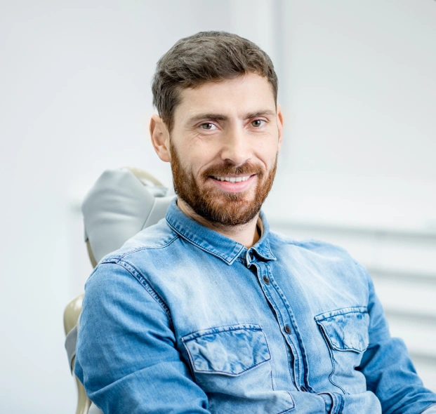 Smiling patient benefiting from enamel remineralization treatment